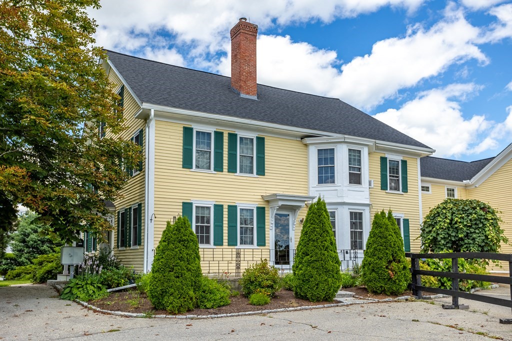120 Goldsmith Street, Unit 3 Littleton, MA 01460 - Photo 1 of 33 a front view of a house with garden