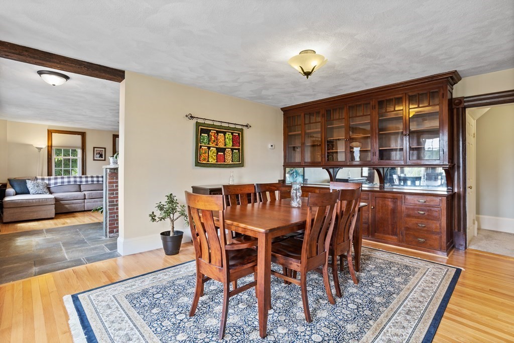 120 Goldsmith Street, Unit 3 Littleton, MA 01460 - Photo 12 of 33 a dining room with furniture and wooden floor