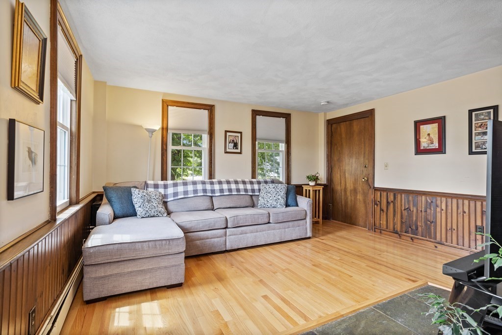 120 Goldsmith Street, Unit 3 Littleton, MA 01460 - Photo 15 of 33 a living room with furniture and a window