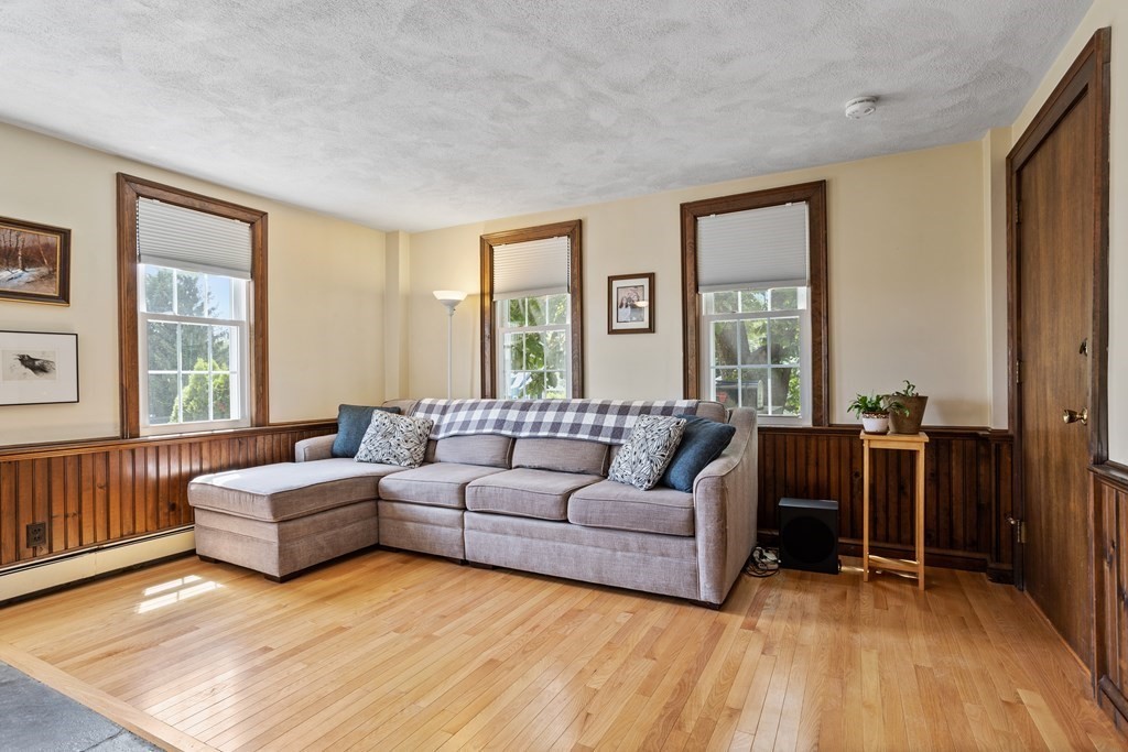 120 Goldsmith Street, Unit 3 Littleton, MA 01460 - Photo 16 of 33 a living room with furniture and a window