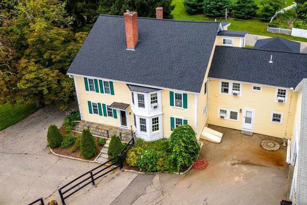 120 Goldsmith Street, Unit 3 Littleton, MA 01460 - Photo 25 of 33 an aerial view of a house with garden space and street view