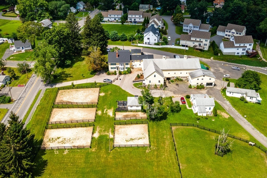 120 Goldsmith Street, Unit 3 Littleton, MA 01460 - Photo 28 of 33 an aerial view of residential houses with outdoor space and swimming pool