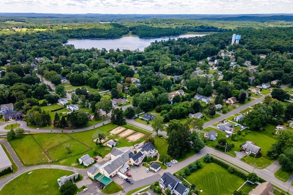 120 Goldsmith Street, Unit 3 Littleton, MA 01460 - Photo 30 of 33 an aerial view of residential houses with outdoor space and swimming pool