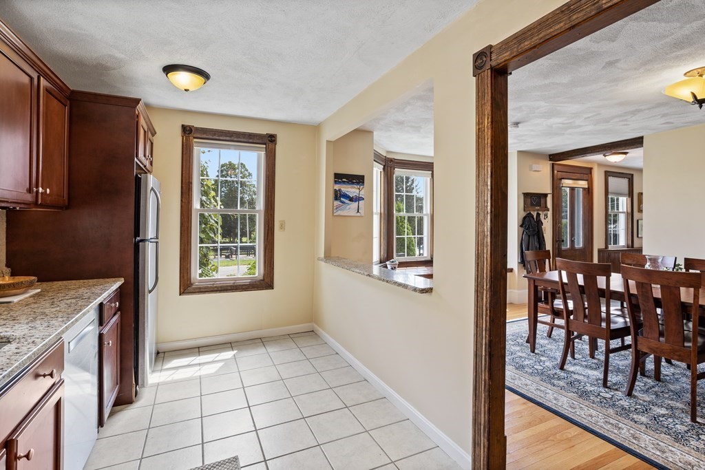 120 Goldsmith Street, Unit 3 Littleton, MA 01460 - Photo 9 of 33 a view of a kitchen with furniture and staircase