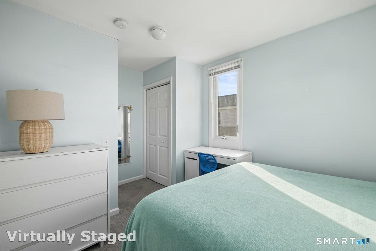 116 College Place Fairfield, CT 06824 - Photo 20 of 26 Bed has been virtually augmented with linens. All furniture is real.