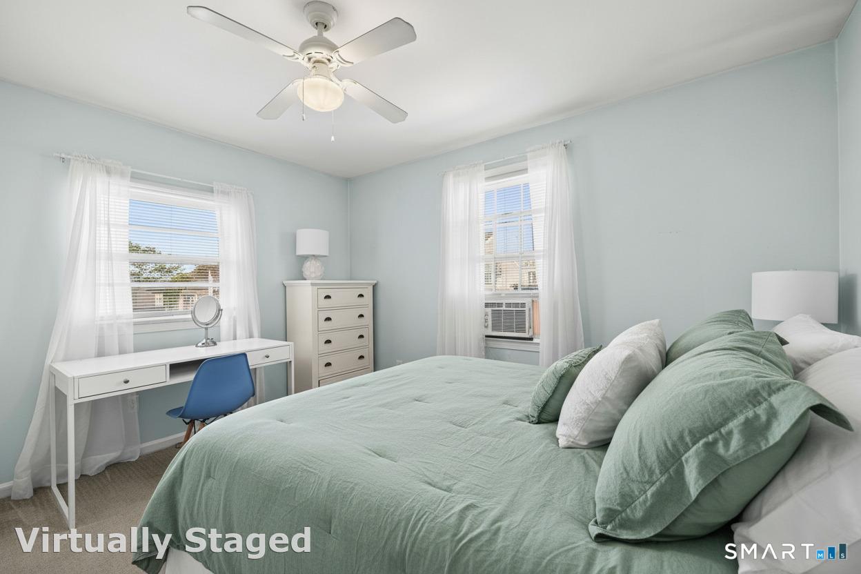 116 College Place Fairfield, CT 06824 - Photo 22 of 26 Bed has been virtually augmented with linens. All furniture is real.