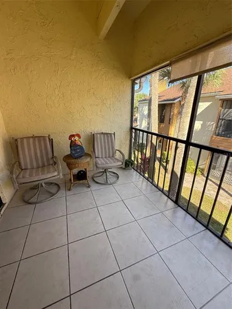 a balcony with outdoor seating