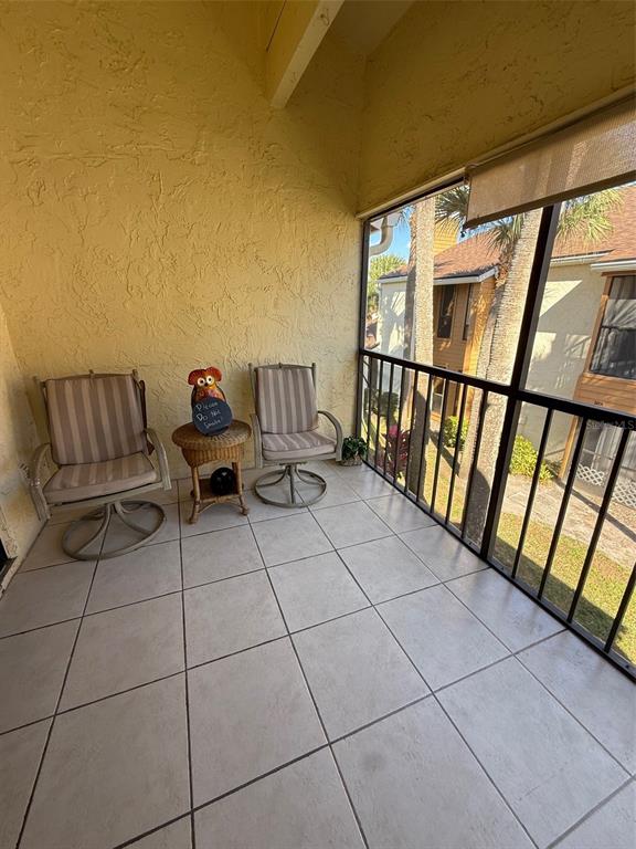 6206 Raintree Drive, Unit GE Orlando, FL 32822 - Photo 18 of 18 a balcony with outdoor seating