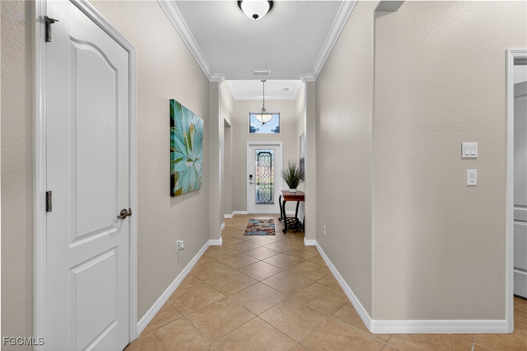 2727 Via Piazza Loop Fort Myers, FL 33905 - Photo 5 of 35 a view of a hallway with windows and closet