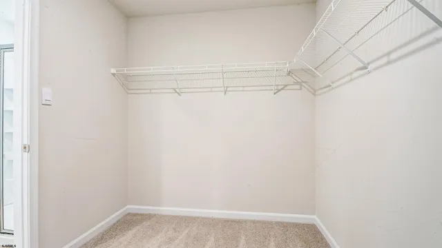 a view of a room with racks on the wall