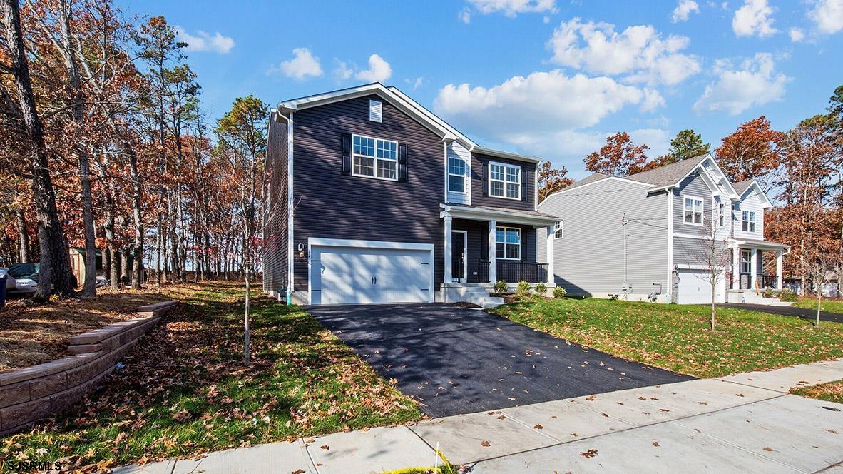 7 Emilie Court Richland, NJ 08350 - Photo 2 of 23 a front view of a house with a yard