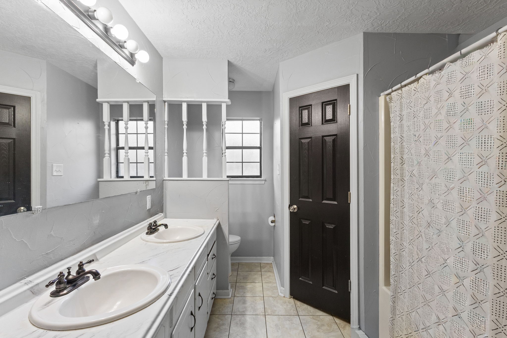 125 Williams Road Lumberton, TX 77657 - Photo 16 of 22 a bathroom with a sink a toilet and shower