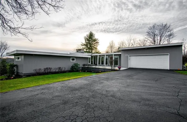 a house view with a garden space