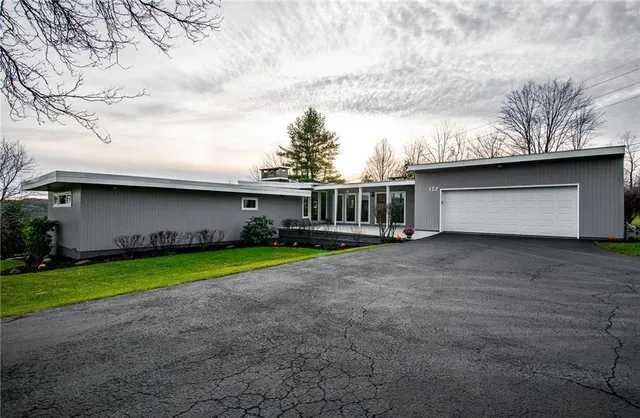 a house view with a garden space