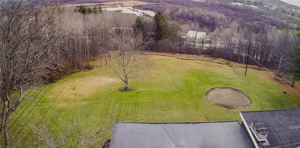 a kitchen with stainless steel appliances granite countertop a refrigerator and a stove