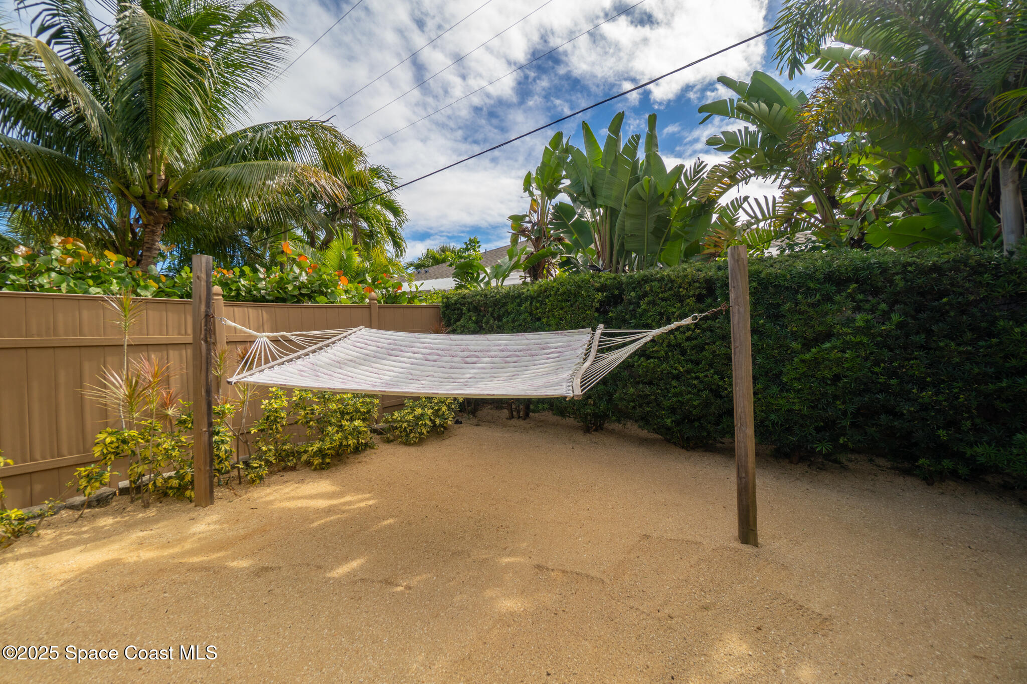 131 Harding Avenue, Unit 131 & 129 Cocoa Beach, FL 32931 - Photo 34 of 47 a view of outdoor space and yard