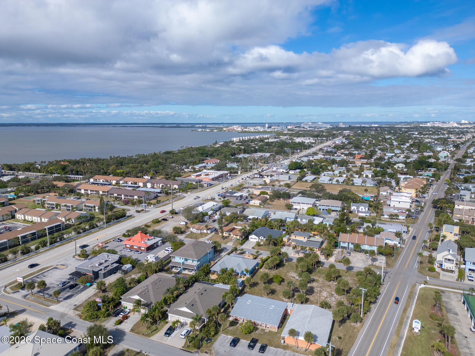 131 Harding Avenue, Unit 131 & 129 Cocoa Beach, FL 32931 - Photo 37 of 47 an aerial view of a city