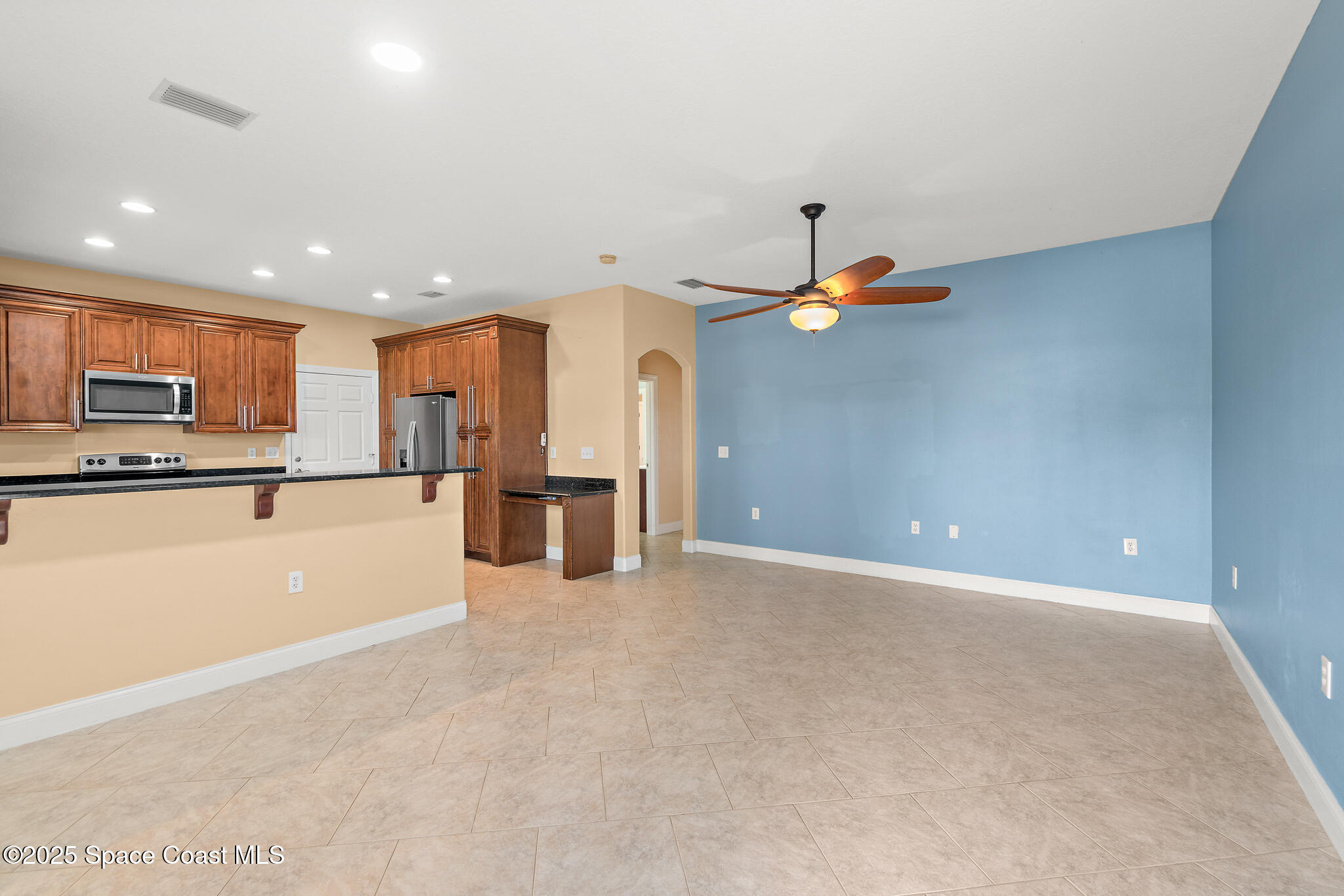 131 Harding Avenue, Unit 131 & 129 Cocoa Beach, FL 32931 - Photo 6 of 47 a view of a kitchen with a sink