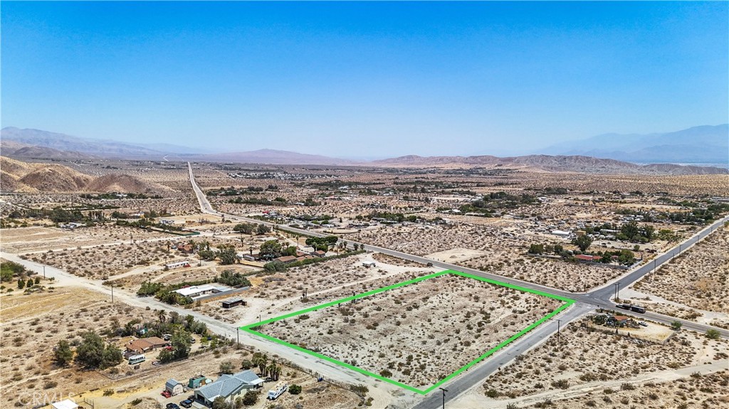 5 Dillon Road Desert Hot Springs, CA 92241 - Photo 3 of 25 an aerial view of residential houses with outdoor space