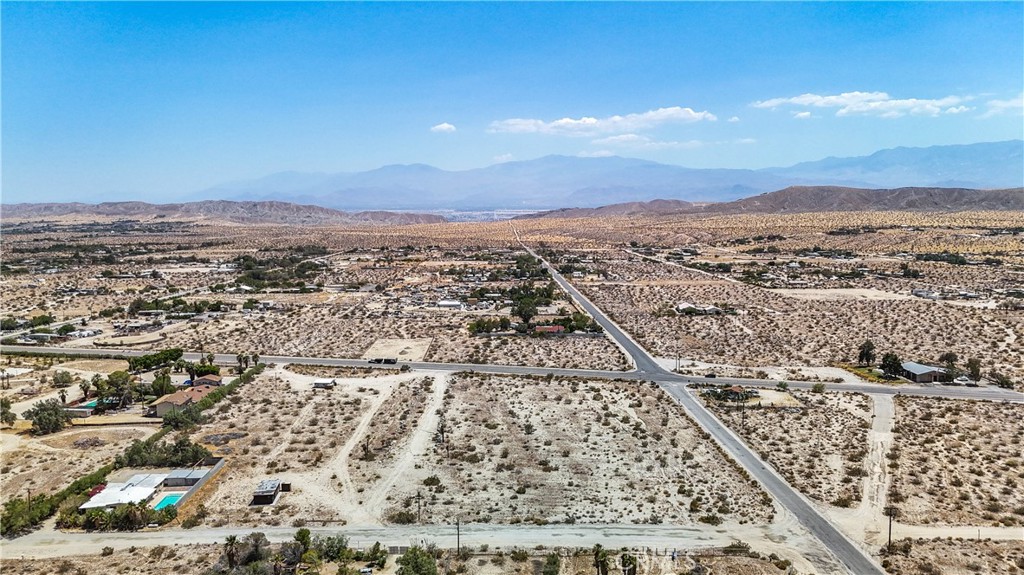 5 Dillon Road Desert Hot Springs, CA 92241 - Photo 9 of 25 an aerial view of residential building and street