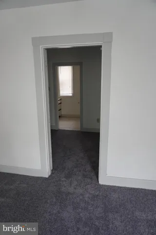 a view of hallway with closet