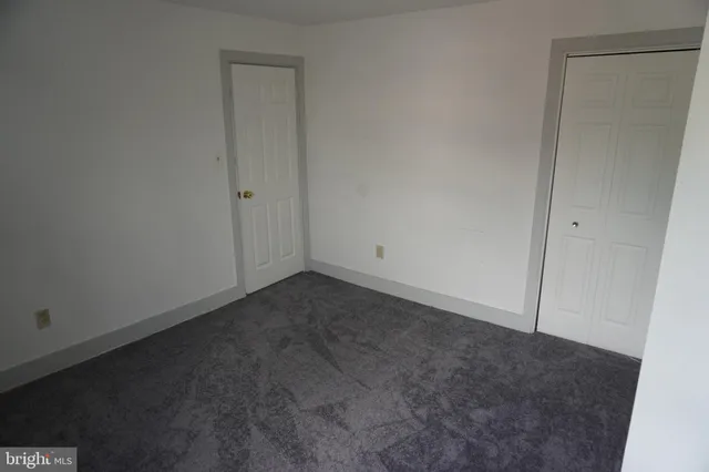 an empty room with closet
