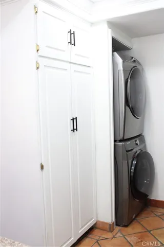 a kitchen with granite countertop a sink and a window