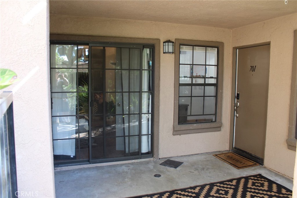 1052 Calle Del Cerro, Unit 701 San Clemente, CA 92672 - Photo 2 of 14 a view of an entrance door