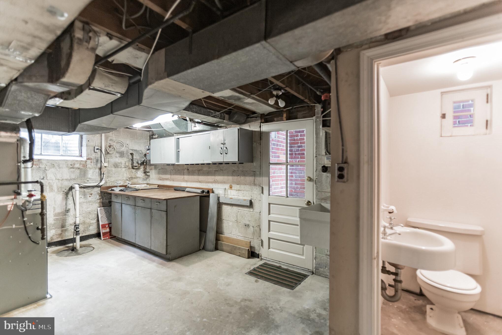 2803 Cameron Mills Road Alexandria, VA 22302 - Photo 30 of 32 storage area with door/stairwell to outside