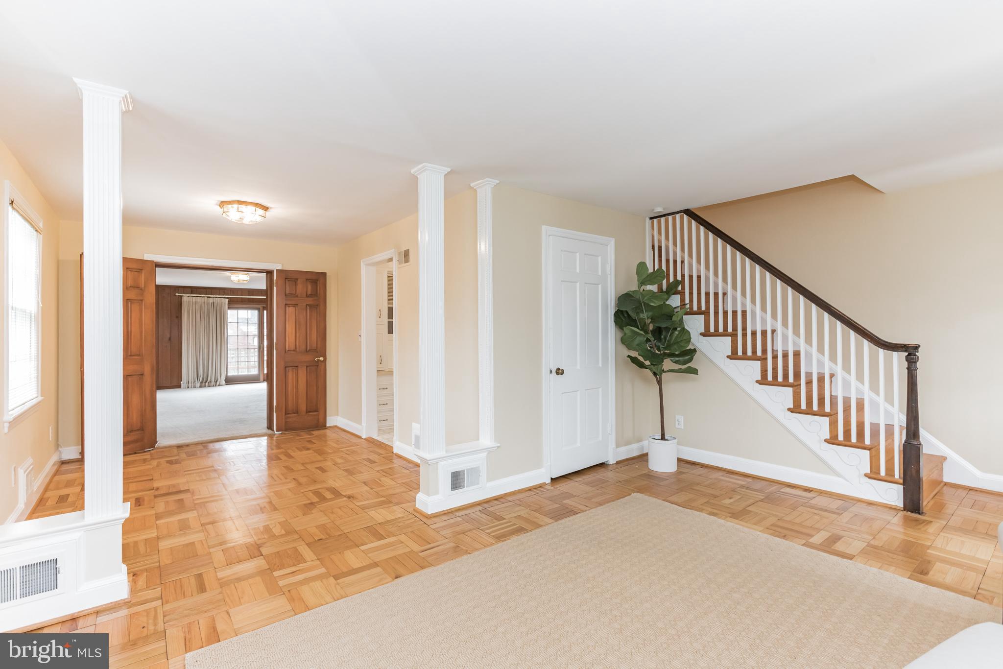 2803 Cameron Mills Road Alexandria, VA 22302 - Photo 5 of 32 Living Room looking toward the back of the home