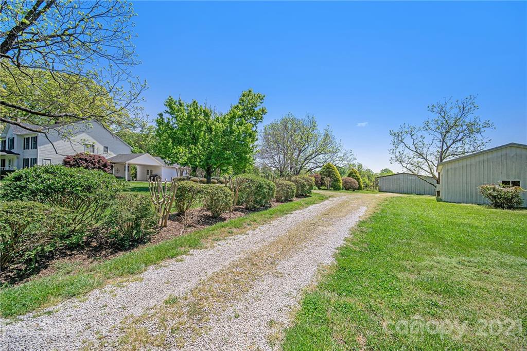 485 Mt Tabor Road Cleveland, NC 27013 - Photo 3 of 28 a view of a house with a yard