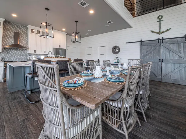 a bedroom with a bed and a table