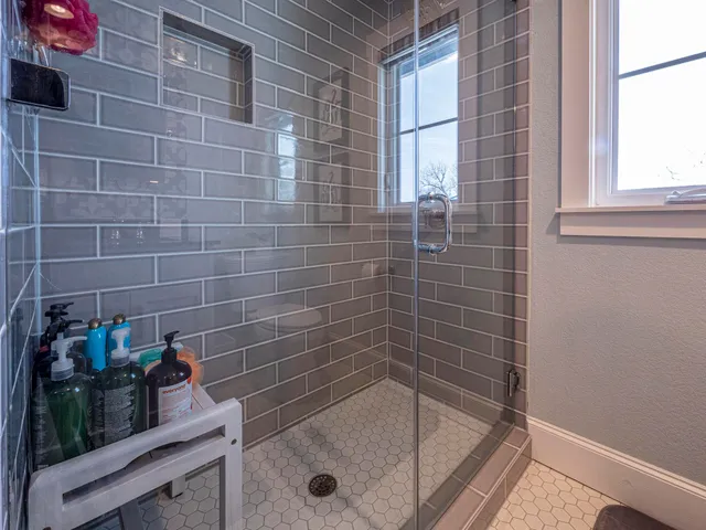 a kitchen with stainless steel appliances granite countertop a stove and a sink
