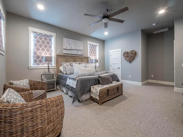 a view of a swimming pool with a table and chairs