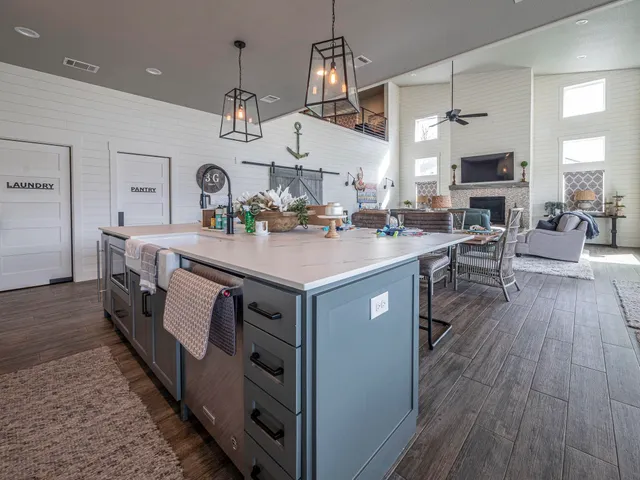 a bedroom with a bed a mirror and furniture