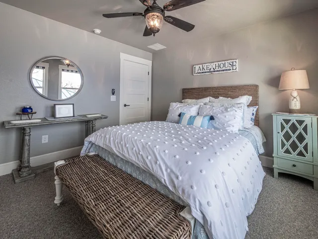 an open kitchen with a dining table and chairs