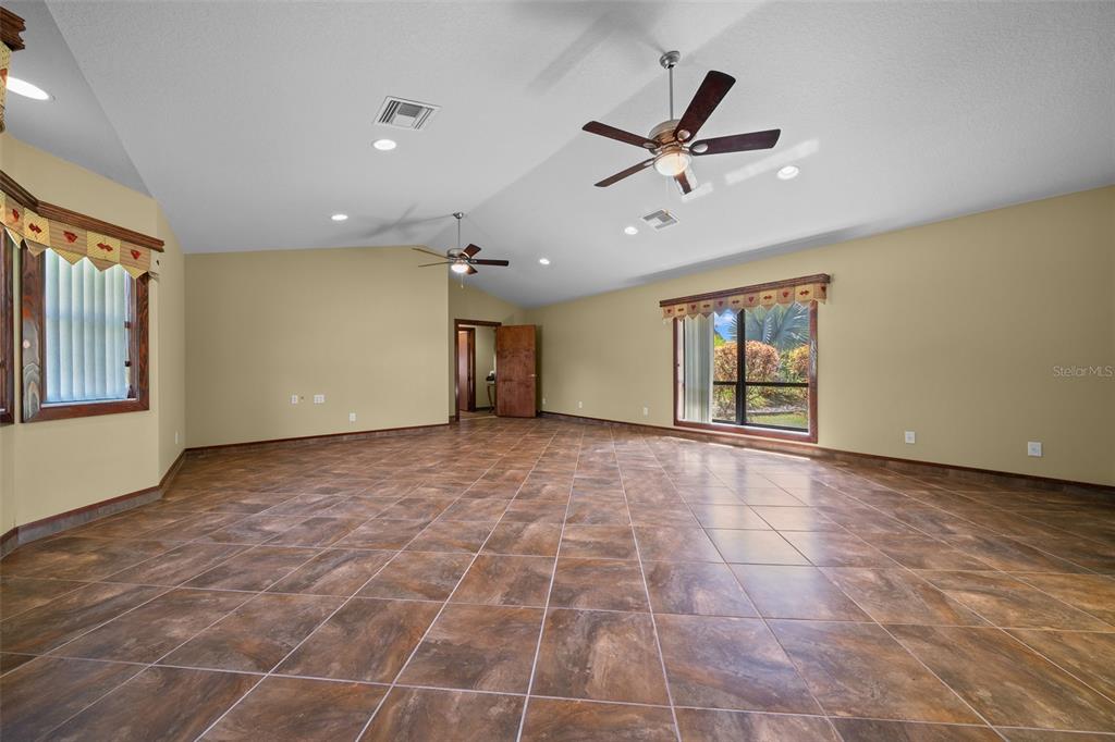 5950 Southwest 21st Avenue Road Ocala, FL 34471 - Photo 19 of 79 a view of an empty room with a window