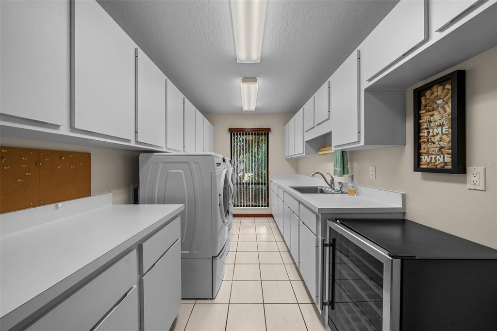 5950 Southwest 21st Avenue Road Ocala, FL 34471 - Photo 38 of 79 a kitchen with a sink and cabinets