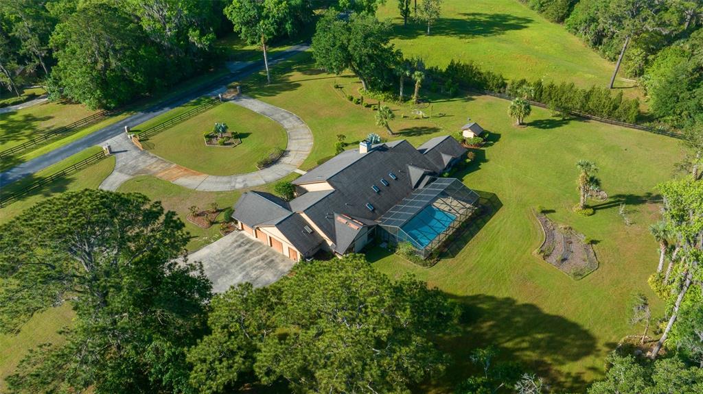 5950 Southwest 21st Avenue Road Ocala, FL 34471 - Photo 63 of 79 an aerial view of a house with outdoor space