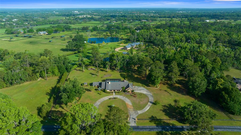 5950 Southwest 21st Avenue Road Ocala, FL 34471 - Photo 68 of 79 a view of a lake with green field