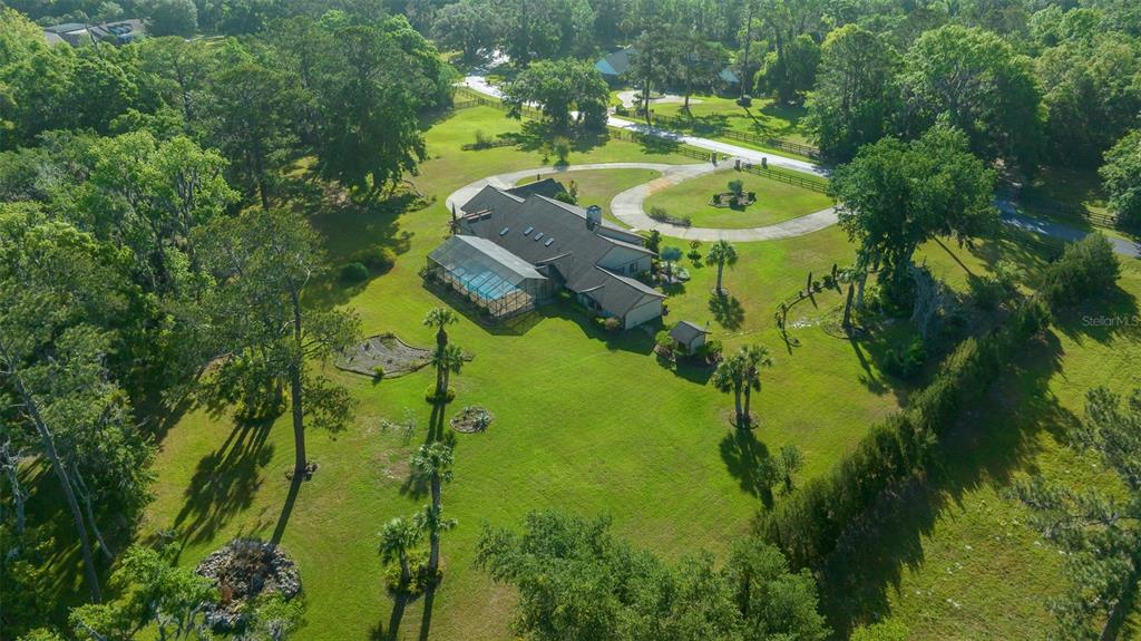 5950 Southwest 21st Avenue Road Ocala, FL 34471 - Photo 72 of 79 a backyard of a house with yard and green space