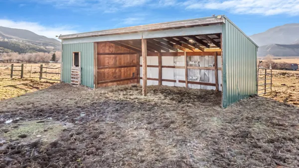 a view of a back yard of the house