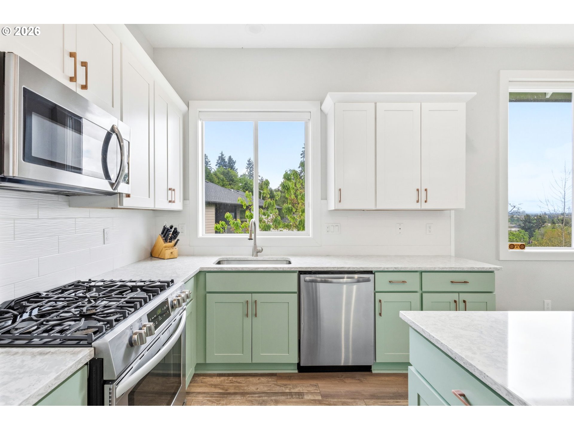 1372 Overview Street Northwest Salem, OR 97304 - Photo 13 of 45 a kitchen with a sink stove top oven and cabinets