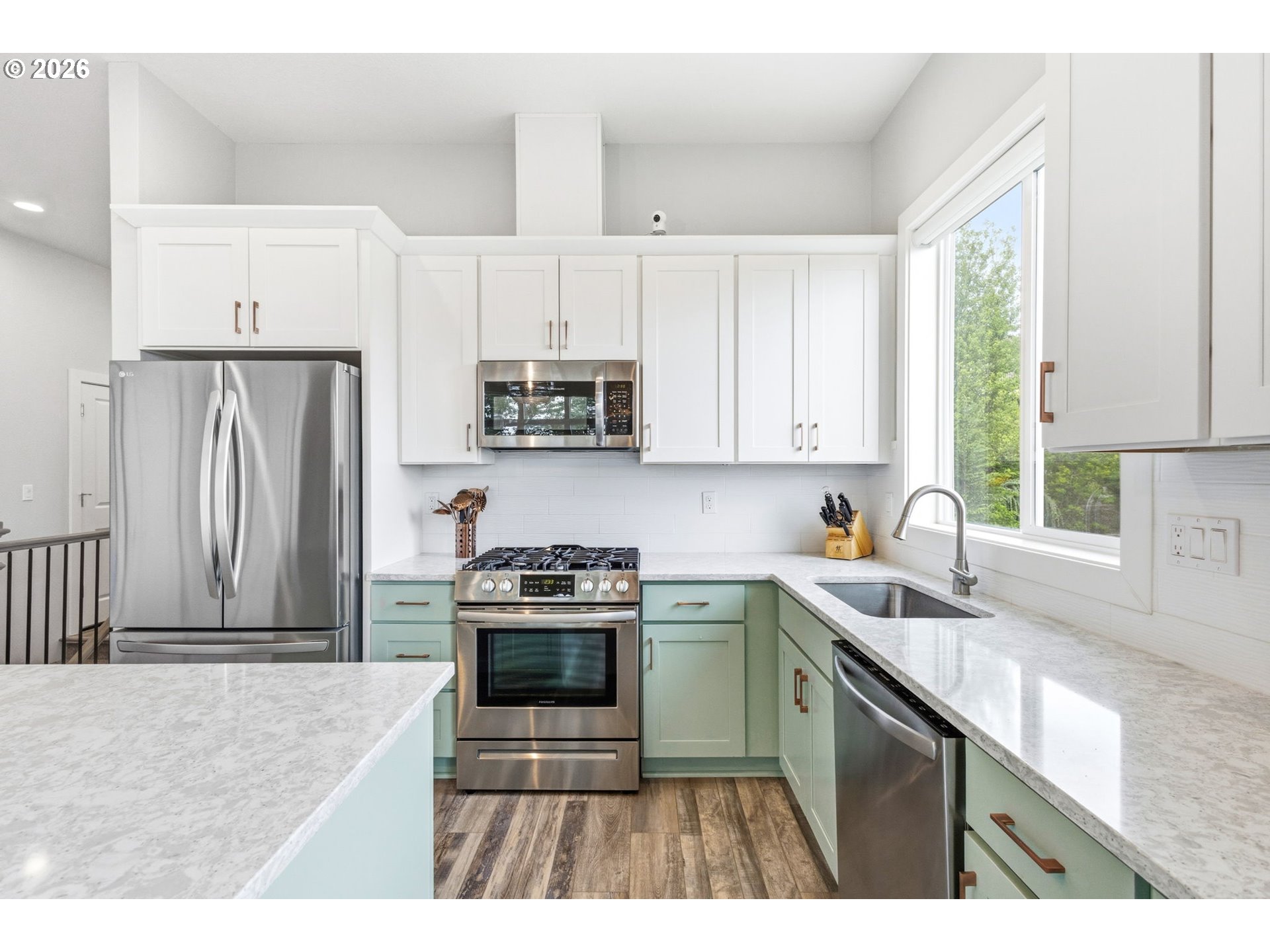 1372 Overview Street Northwest Salem, OR 97304 - Photo 14 of 45 a kitchen with kitchen island granite countertop a stove a sink and a refrigerator