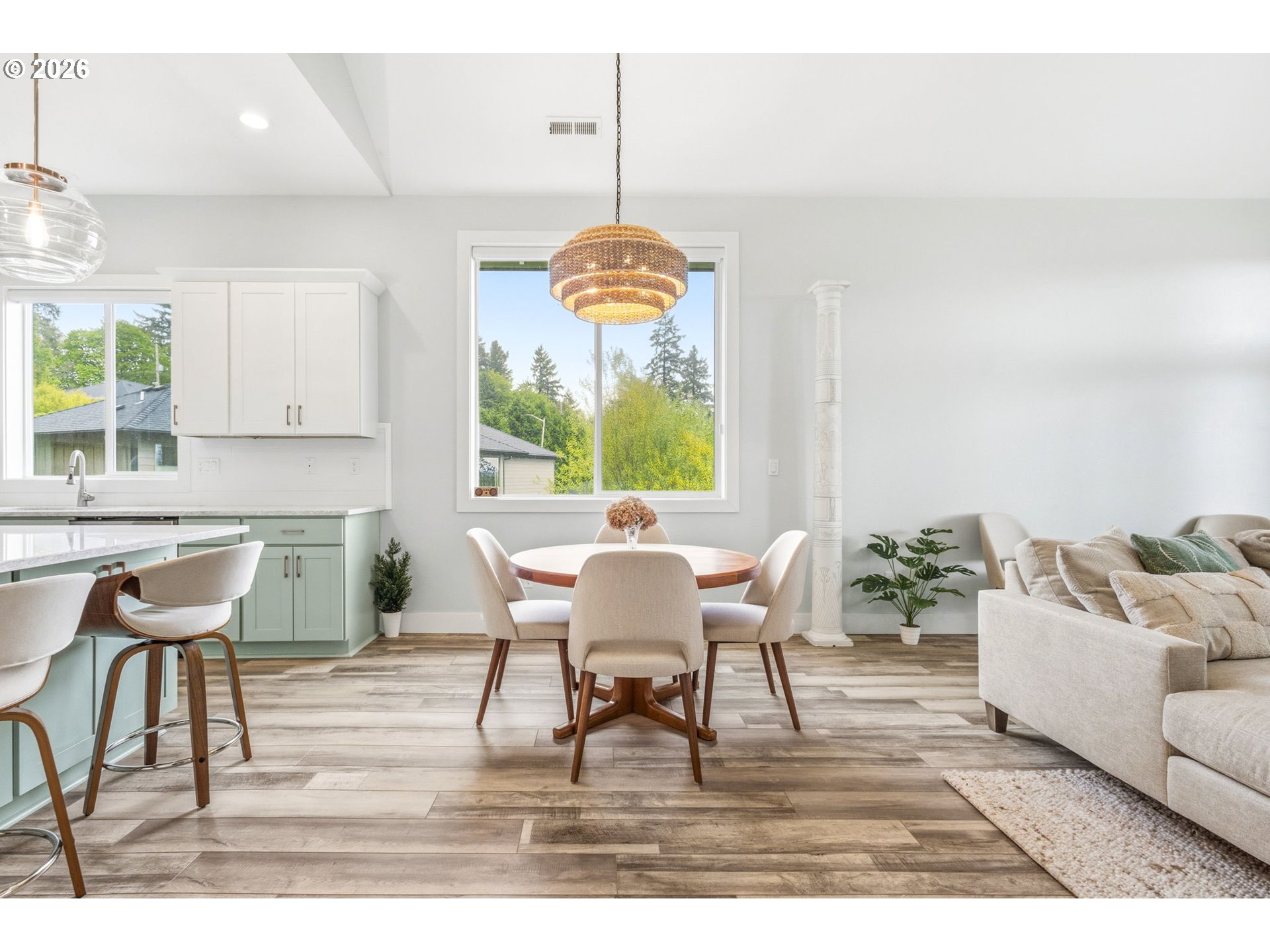 1372 Overview Street Northwest Salem, OR 97304 - Photo 15 of 45 a dining room with furniture a window and a chandelier