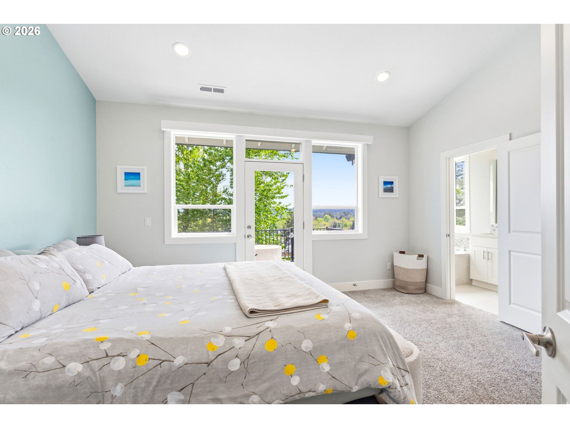 1372 Overview Street Northwest Salem, OR 97304 - Photo 20 of 45 a bedroom with a large bed and a large window