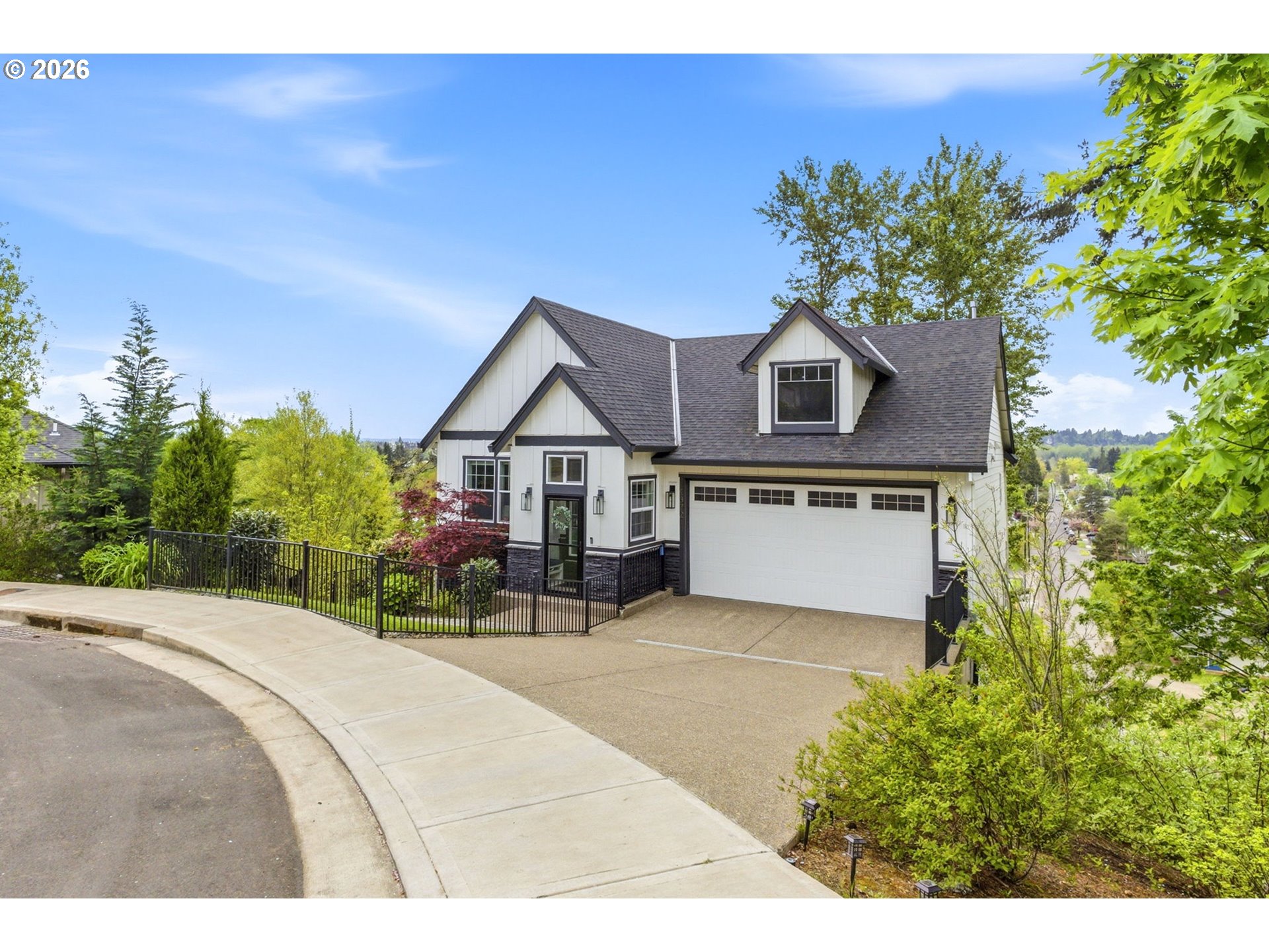1372 Overview Street Northwest Salem, OR 97304 - Photo 2 of 45 a front view of a house with a yard and garage