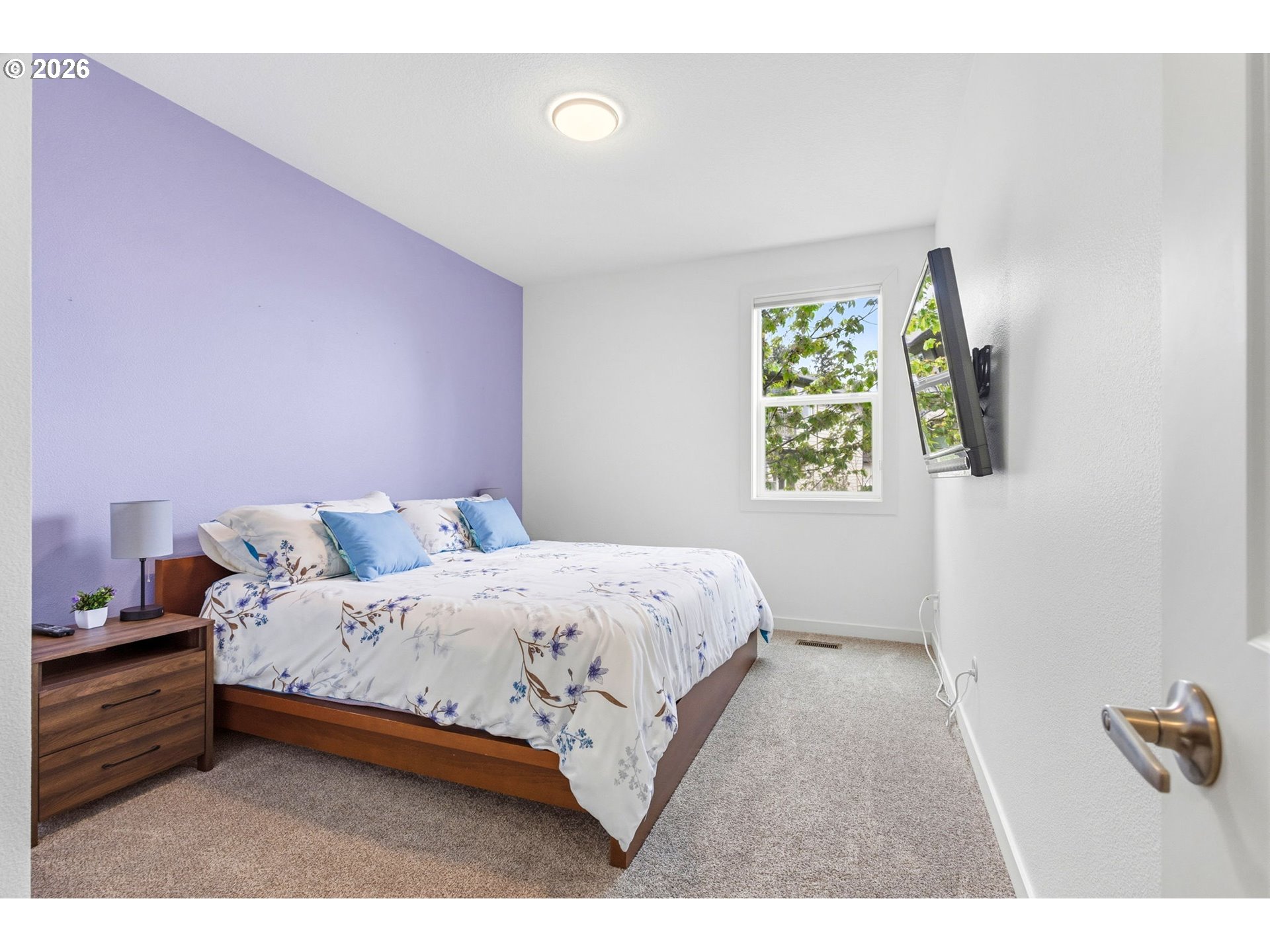 1372 Overview Street Northwest Salem, OR 97304 - Photo 28 of 45 a bedroom with a bed and a window