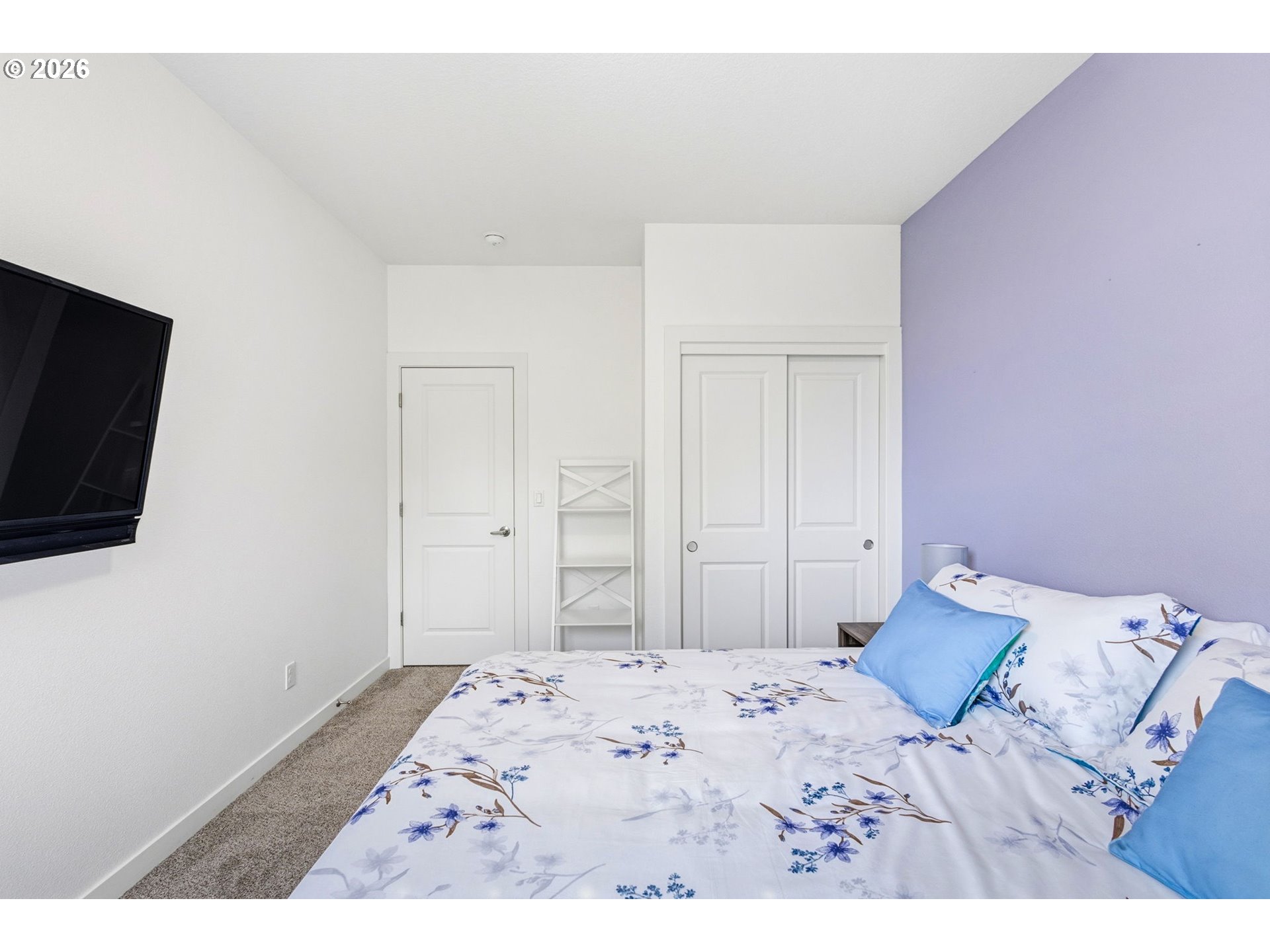 1372 Overview Street Northwest Salem, OR 97304 - Photo 29 of 45 a bedroom with a bed and a flat screen tv