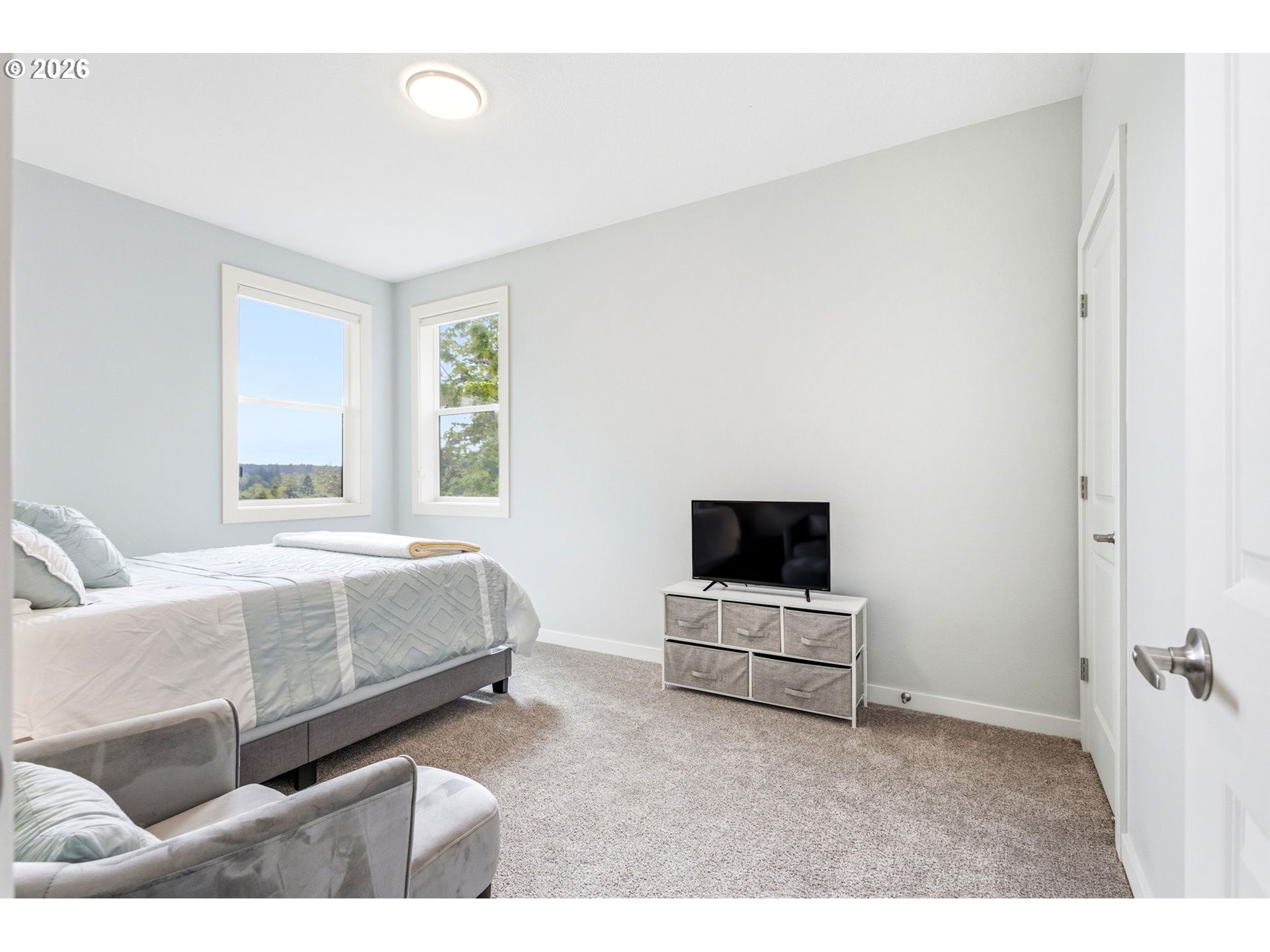 1372 Overview Street Northwest Salem, OR 97304 - Photo 36 of 45 a living room with a bed furniture and flat screen tv